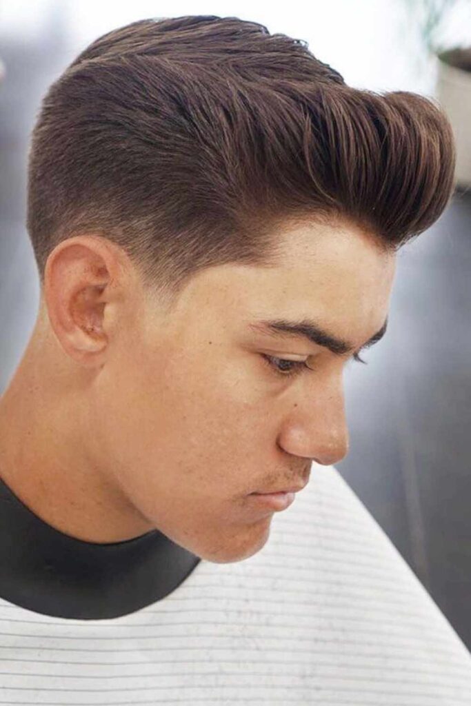 Low Taper Fade Straight Hair: 30 Sharp, Modern Haircuts Every Man Should Try in 2026 4 Low Taper Pompadour
